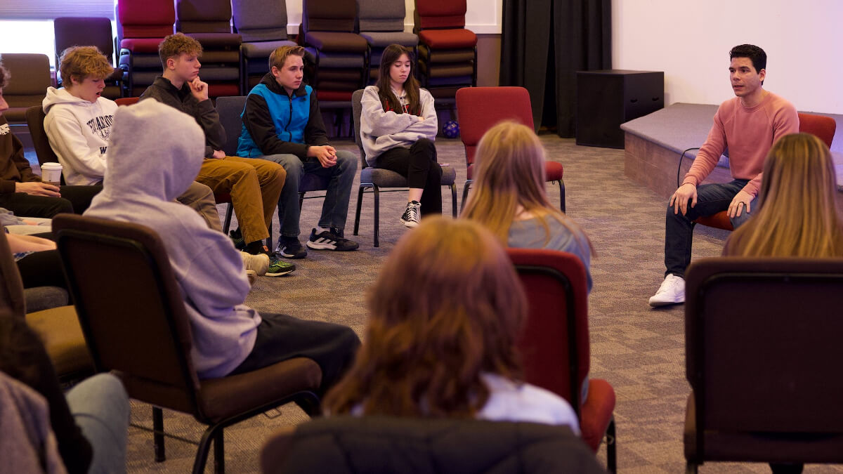 students sitting in circle