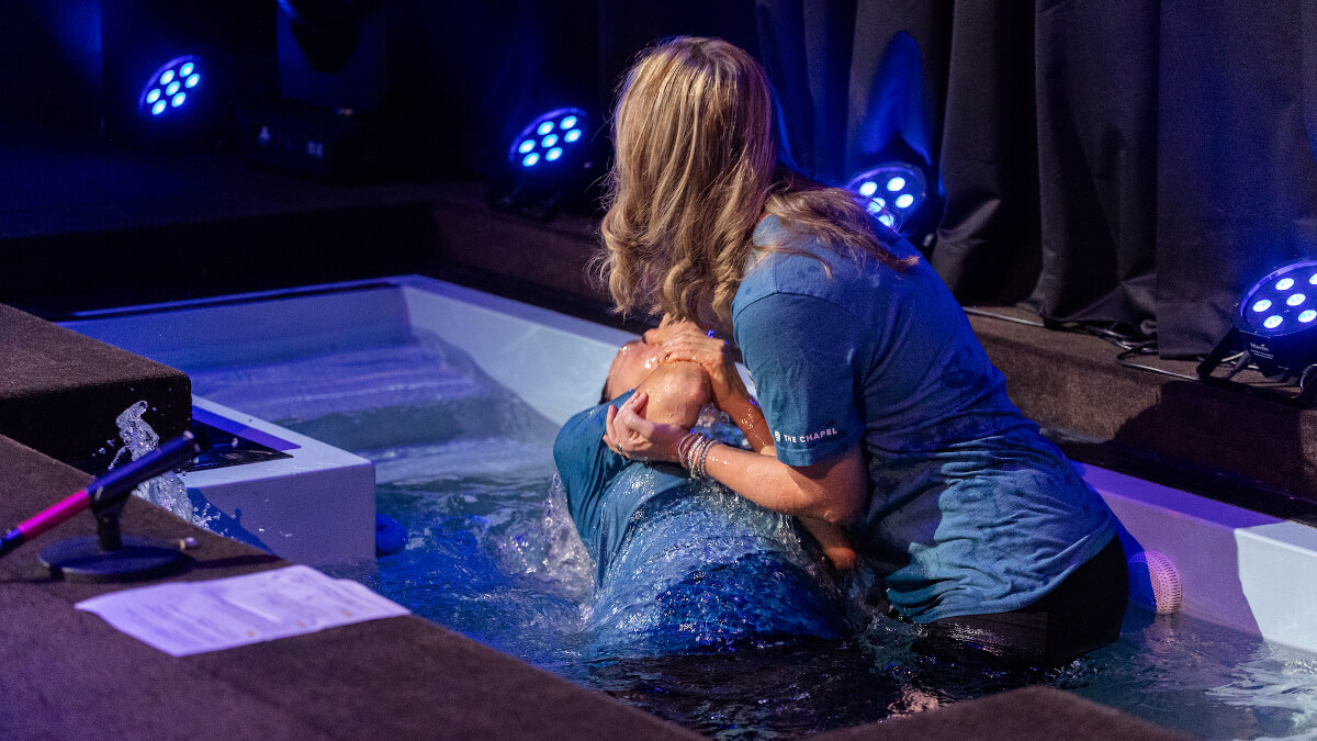 man being baptized